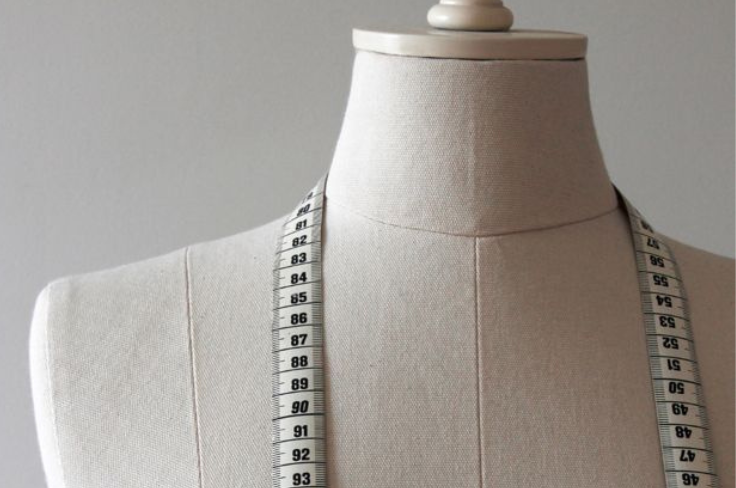 Mannequin avec mètre 